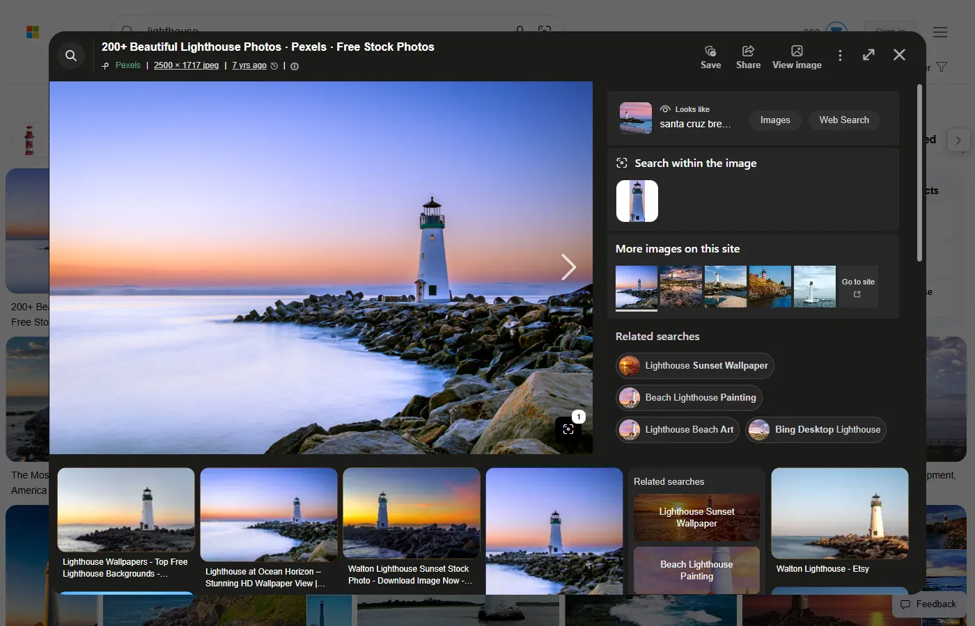 Bing's detail panel for a Pexels lighthouse photo, with the line Pexels, 2500 × 1717 jpeg, 7 yrs ago under the title and the Save, Share and View image buttons at the top right
